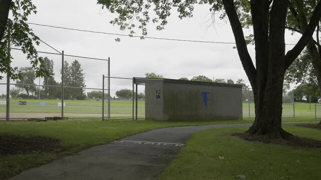 Baseball field and a baseball dugout at a local park.