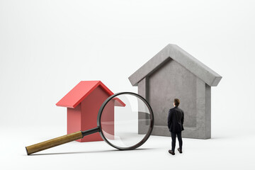 Businessman examining real estate property market with magnifying glass near red and gray house symbols on light background, concept of analysis.