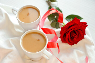 Fresh aromatic coffee in bed. Coffee for two.
