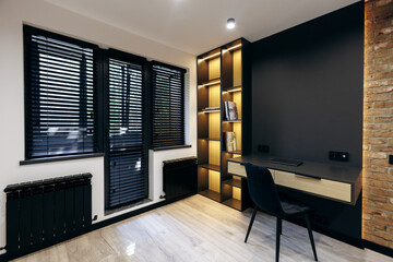 Modern home office design includes sleek furniture and natural light for a productive workspace