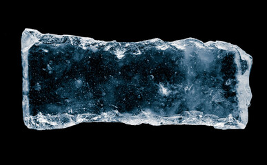 Ice block, isolated on a black background.