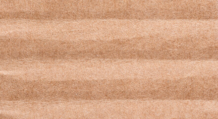 Fototapeta premium Corrugated cardboard, brown textured paper background