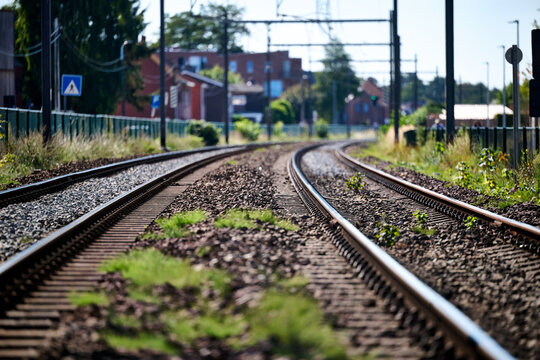 railroad tracks bending to the right