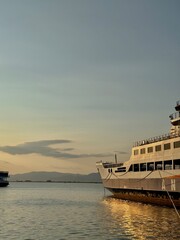 Fototapeta premium cruise ship at sunset