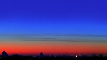 Obraz premium Vibrant City Sunset: A Colorful Sky, Dusk, and Urban Silhouette