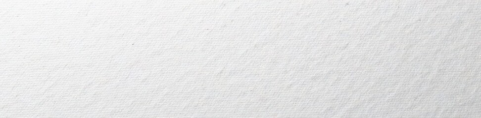 Close-up view of a pristine white canvas showing subtle weave , design, linen