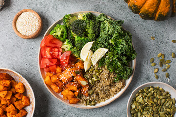 Healthy vegan Buddha bowl with quinoa, pumpkin and seasonal vegetables. Vegetable recipes.