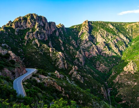 Mountain road winding through a valley