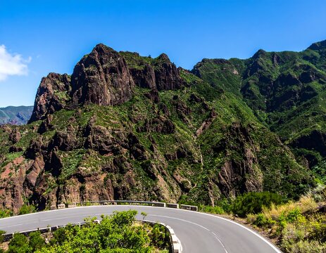 Mountain road winding through valley (1)