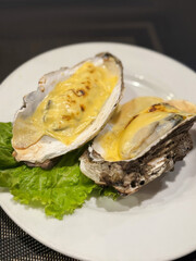 Melty golden oysters whisper umami secrets on crisp lettuce, perfect for Shuckfest revelry or Umhlanga cultural feasts