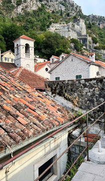 Ancient rooftops of Kotor whisper medieval serenity, capturing Montenegrin spirit amidst the mystical glow of Ilinden celebrations