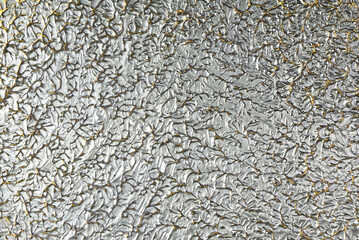 decorative glossy metallic abstract backrgound relief silver gold