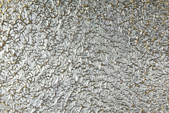 decorative glossy metallic abstract backrgound relief silver gold