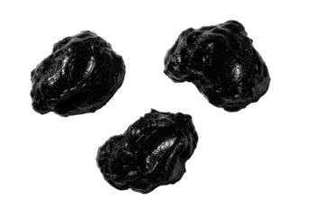 Three distinct, glossy smears of dark, unctuous crude oil with tar-like texture and deep shadows on a transparent background, macro close-up. Concept of raw energy resources
