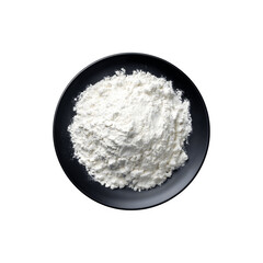 White flour served on a black plate
