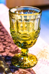 Elegant green glass in the castle restaurant in Mir Belarus.