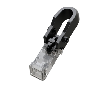 Black and clear plastic device, likely a mount or connector.  Shows intricate mechanical components