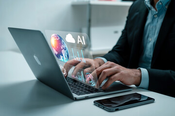 Close-up of a person's hands typing on a laptop keyboard demonstrating digital data visualization and technology in a modern office setting