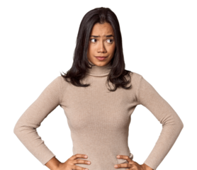 Young filipino woman confused, feels doubtful and unsure.