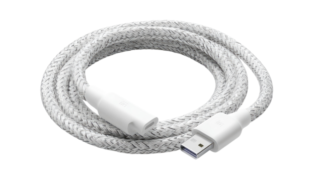 A coiled, white USB charging cable - Powered by Adobe