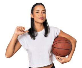 Young Filipino woman with basketball feels proud and self confident, example to follow.