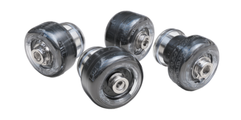 Four black, round, industrial-looking components