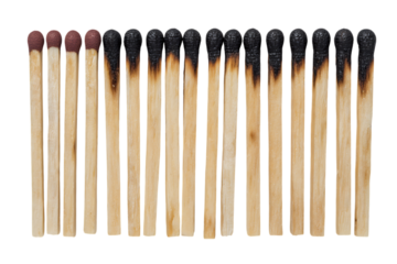 Close up of matches, some burnt, others intact.