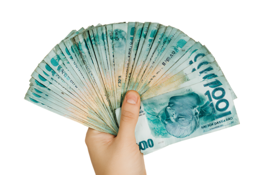 Hand holding a fan of Philippine Pesos.