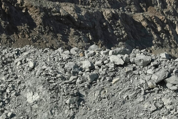 Piles of stones of gold bearing ore