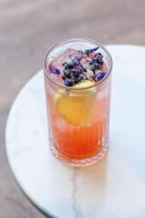 Refreshing summer lemonade with orange and lemon slices