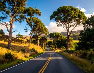 Naklejka premium A scenic country road winds through a landscape of lush greenery and rolling hills under a vibrant blue sky.