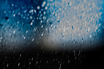 background texture for background with water drops of blue and black gray color, with shimmering elements and flowing drops on glass, beautiful bright background with overflows and gradient in slight 