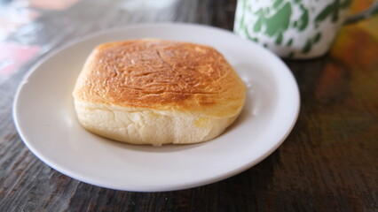 Traditional Indonesian roti bakar served on white plate  
