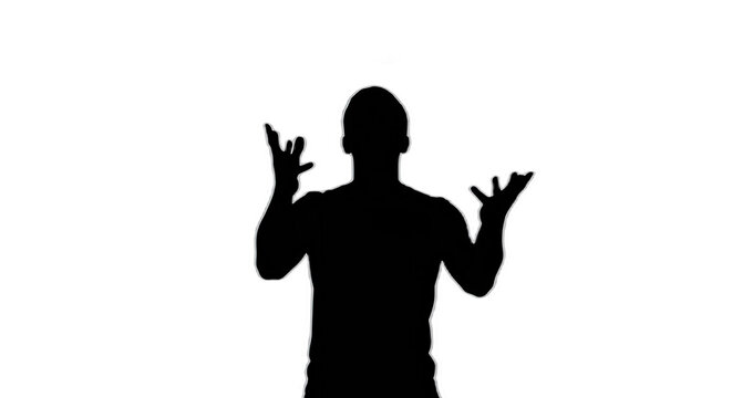 Silhouette of a person with hands raised in a gesturing pose against a black background - Powered by Adobe