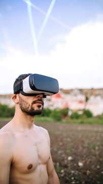 Man wearing VR headset in outdoor setting