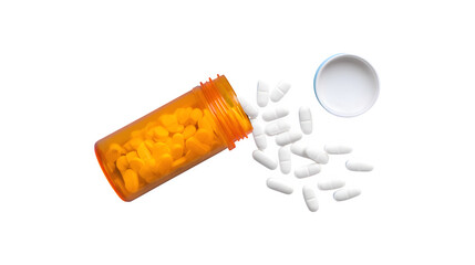 Top view of an orange pill bottle with white pills spilling out
