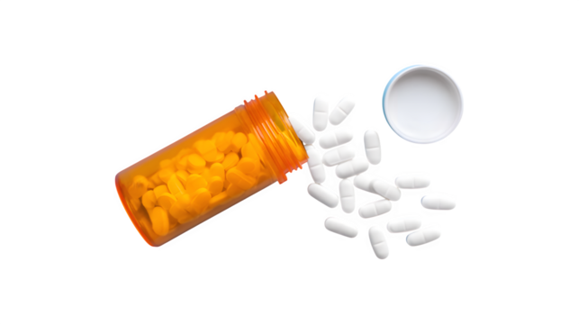 Top view of an orange pill bottle with white pills spilling out
