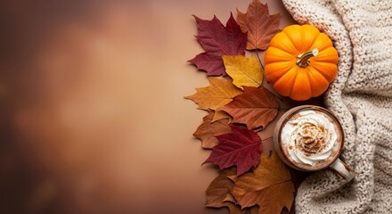 Cozy autumn scene with pumpkin spice latte, maple leaves, and warm sweater.