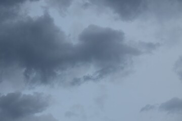 Fototapeta premium Blue sky with scattered white cumulus clouds