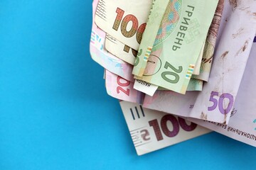 Big amount of different Ukrainian hryvnia money bills. Pile of crumpled ukrainian banknotes