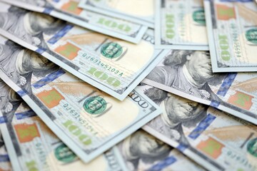 Lots of american dollar bills in big stack. United states money banknotes