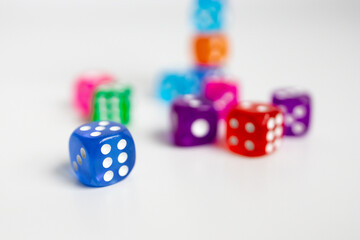 Colorful assortment of dice on white background