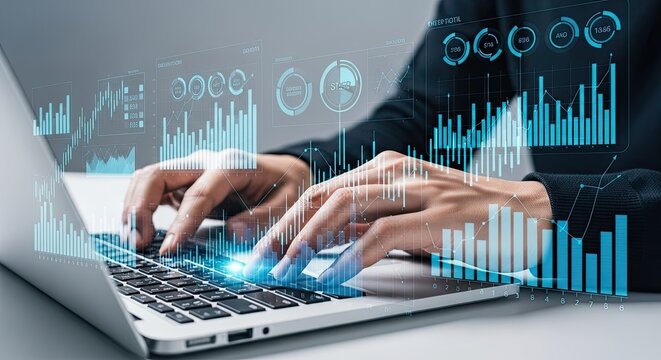 Close up of hands typing on a laptop with futuristic glowing data charts and graphs overlayed