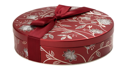 A red round gift box with floral pattern and ribbon