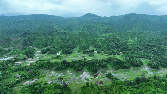 Aerial view of dense green hills stretching into the horizon, showcasing the natural beauty of the landscape, Ramu, Chittagong Division, Bangladesh.
