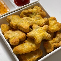 Crispy golden nuggets with a juicy, tender center, offering a perfect bite of savory flavor and satisfying crunch in every delicious, snackable piece.
