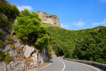 Mountain Road Curve, Blue Sky, Cliffside Vegetation