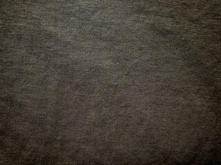 dark gray knitted fabric texture close up with fine threads perfect for textile background or fashion material design use