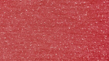 rich red woven textile with subtle white fleck detail ideal for modern fabric texture background or stylish design surface
