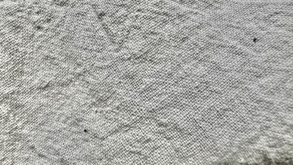 light gray woven fabric texture closeup with subtle crisscross pattern ideal for textile background or digital design surface